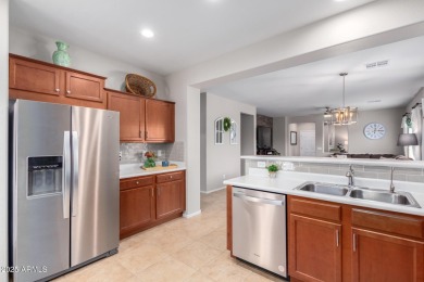 This Raven model shows like a NEW HOME but w/ a HUGE paver patio on Poston Butte Golf Club in Arizona - for sale on GolfHomes.com, golf home, golf lot
