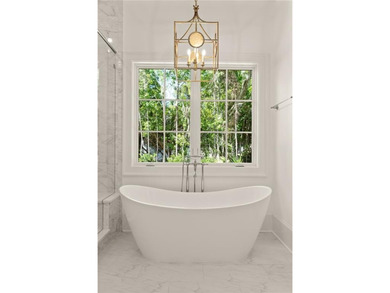 Step into a world of refined elegance with this stunning on Frederica Golf Club in Georgia - for sale on GolfHomes.com, golf home, golf lot