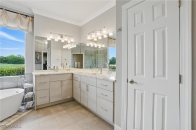 Welcome home to this elegant $100k remodel, first-floor on Quail West Golf and Country Club in Florida - for sale on GolfHomes.com, golf home, golf lot