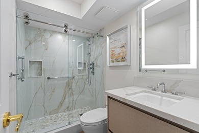 ABSOLUTELY STUNNING WATERFRONT CONDO | BREATHTAKING GOLF COURSE on Palm-Aire Country Club and Resort - The Oaks in Florida - for sale on GolfHomes.com, golf home, golf lot