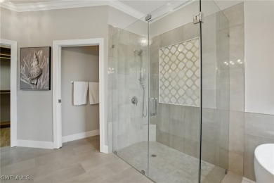 Welcome home to this elegant $100k remodel, first-floor on Quail West Golf and Country Club in Florida - for sale on GolfHomes.com, golf home, golf lot