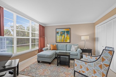 ABSOLUTELY STUNNING WATERFRONT CONDO | BREATHTAKING GOLF COURSE on Palm-Aire Country Club and Resort - The Oaks in Florida - for sale on GolfHomes.com, golf home, golf lot