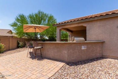 This Raven model shows like a NEW HOME but w/ a HUGE paver patio on Poston Butte Golf Club in Arizona - for sale on GolfHomes.com, golf home, golf lot