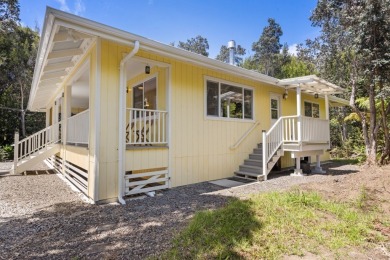 Step into 99-1919 Pukeawe Circle, a fully-furnished three on Volcano Golf and Country Club in Hawaii - for sale on GolfHomes.com, golf home, golf lot