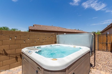 This Raven model shows like a NEW HOME but w/ a HUGE paver patio on Poston Butte Golf Club in Arizona - for sale on GolfHomes.com, golf home, golf lot