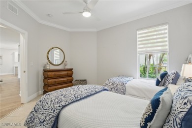 Welcome home to this elegant $100k remodel, first-floor on Quail West Golf and Country Club in Florida - for sale on GolfHomes.com, golf home, golf lot