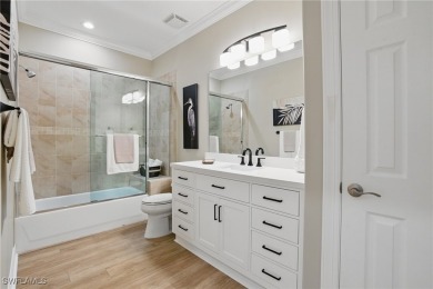 Welcome home to this elegant $100k remodel, first-floor on Quail West Golf and Country Club in Florida - for sale on GolfHomes.com, golf home, golf lot