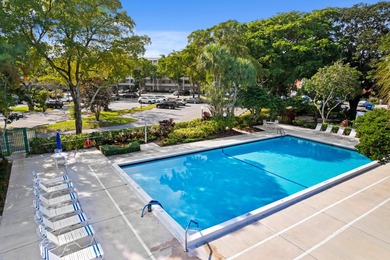 ABSOLUTELY STUNNING WATERFRONT CONDO | BREATHTAKING GOLF COURSE on Palm-Aire Country Club and Resort - The Oaks in Florida - for sale on GolfHomes.com, golf home, golf lot