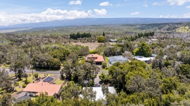 Step into 99-1919 Pukeawe Circle, a fully-furnished three on Volcano Golf and Country Club in Hawaii - for sale on GolfHomes.com, golf home, golf lot