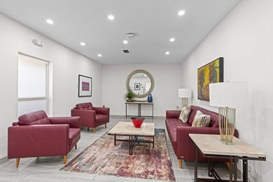 ABSOLUTELY STUNNING WATERFRONT CONDO | BREATHTAKING GOLF COURSE on Palm-Aire Country Club and Resort - The Oaks in Florida - for sale on GolfHomes.com, golf home, golf lot