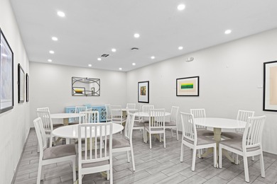 ABSOLUTELY STUNNING WATERFRONT CONDO | BREATHTAKING GOLF COURSE on Palm-Aire Country Club and Resort - The Oaks in Florida - for sale on GolfHomes.com, golf home, golf lot