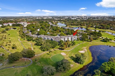 ABSOLUTELY STUNNING WATERFRONT CONDO | BREATHTAKING GOLF COURSE on Palm-Aire Country Club and Resort - The Oaks in Florida - for sale on GolfHomes.com, golf home, golf lot