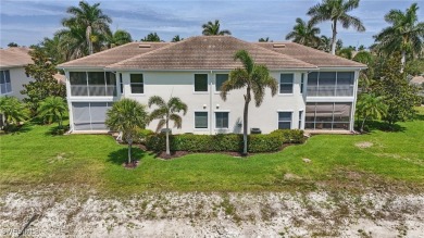 Welcome home to this elegant $100k remodel, first-floor on Quail West Golf and Country Club in Florida - for sale on GolfHomes.com, golf home, golf lot