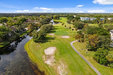 ABSOLUTELY STUNNING WATERFRONT CONDO | BREATHTAKING GOLF COURSE on Palm-Aire Country Club and Resort - The Oaks in Florida - for sale on GolfHomes.com, golf home, golf lot