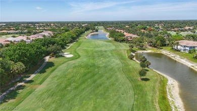 Welcome home to this elegant $100k remodel, first-floor on Quail West Golf and Country Club in Florida - for sale on GolfHomes.com, golf home, golf lot