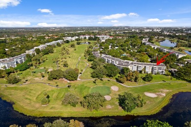 ABSOLUTELY STUNNING WATERFRONT CONDO | BREATHTAKING GOLF COURSE on Palm-Aire Country Club and Resort - The Oaks in Florida - for sale on GolfHomes.com, golf home, golf lot