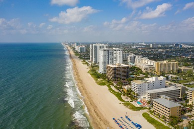 ABSOLUTELY STUNNING WATERFRONT CONDO | BREATHTAKING GOLF COURSE on Palm-Aire Country Club and Resort - The Oaks in Florida - for sale on GolfHomes.com, golf home, golf lot