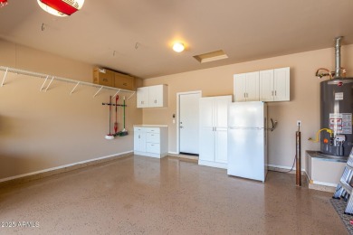 This Raven model shows like a NEW HOME but w/ a HUGE paver patio on Poston Butte Golf Club in Arizona - for sale on GolfHomes.com, golf home, golf lot