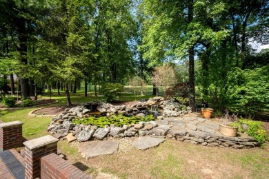 This stunning custom home on the prestigious Founder's Course of on Chenal Country Club - Bear Den Mountain in Arkansas - for sale on GolfHomes.com, golf home, golf lot