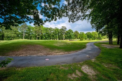 This stunning custom home on the prestigious Founder's Course of on Chenal Country Club - Bear Den Mountain in Arkansas - for sale on GolfHomes.com, golf home, golf lot