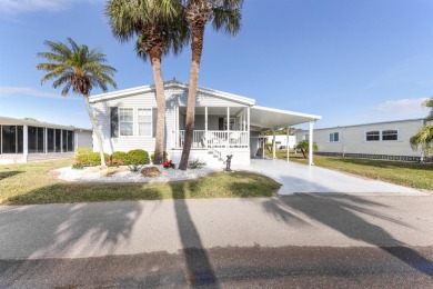 You might just fall in love when you drive up and see how lovely on Maple Leaf Golf and Country Club in Florida - for sale on GolfHomes.com, golf home, golf lot