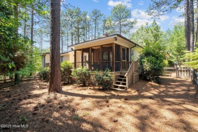 Nestled in the desirable Pinehurst #6 community, this charming on Pinehurst  No. 6 Golf Course in North Carolina - for sale on GolfHomes.com, golf home, golf lot