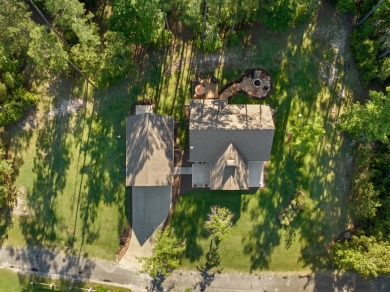 Nestled at 185 Ashley Dr, Brookeland, TX, this stunning Lake Sam on Rayburn Country Club in Texas - for sale on GolfHomes.com, golf home, golf lot