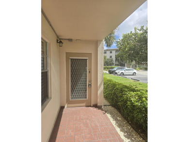 STEP INTO THE SIMPLE ELEGANCE OF THIS GROUND FLOOR CORNER IN on Wynmoor Golf Course in Florida - for sale on GolfHomes.com, golf home, golf lot