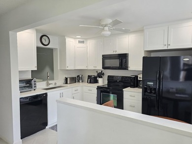 STEP INTO THE SIMPLE ELEGANCE OF THIS GROUND FLOOR CORNER IN on Wynmoor Golf Course in Florida - for sale on GolfHomes.com, golf home, golf lot