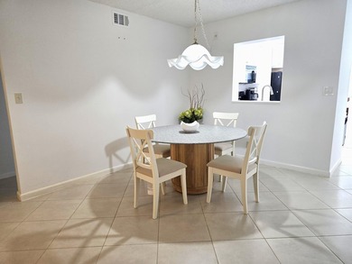 STEP INTO THE SIMPLE ELEGANCE OF THIS GROUND FLOOR CORNER IN on Wynmoor Golf Course in Florida - for sale on GolfHomes.com, golf home, golf lot