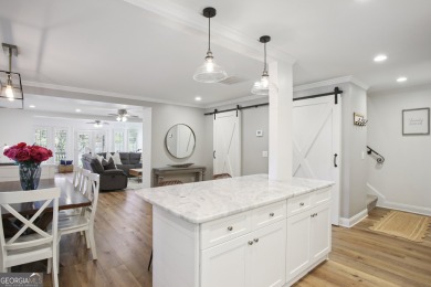 Lakefront living on Lake Peachtree! This stunning corner unit in on Canongate At Flat Creek Club in Georgia - for sale on GolfHomes.com, golf home, golf lot