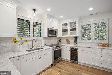 Lakefront living on Lake Peachtree! This stunning corner unit in on Canongate At Flat Creek Club in Georgia - for sale on GolfHomes.com, golf home, golf lot
