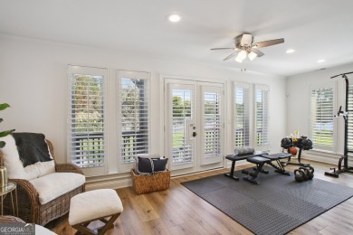 Lakefront living on Lake Peachtree! This stunning corner unit in on Canongate At Flat Creek Club in Georgia - for sale on GolfHomes.com, golf home, golf lot