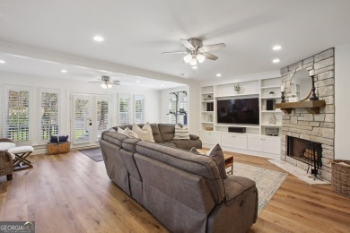 Lakefront living on Lake Peachtree! This stunning corner unit in on Canongate At Flat Creek Club in Georgia - for sale on GolfHomes.com, golf home, golf lot