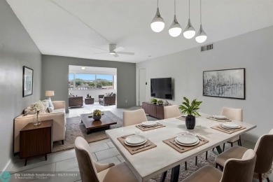 BEAUTIFUL, SPACIOUS 2 BEDROOM, 2 BATH ON THE TOP FLOOR WITH on Sunrise Lakes Phase III in Florida - for sale on GolfHomes.com, golf home, golf lot