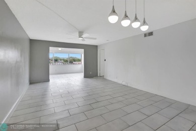 BEAUTIFUL, SPACIOUS 2 BEDROOM, 2 BATH ON THE TOP FLOOR WITH on Sunrise Lakes Phase III in Florida - for sale on GolfHomes.com, golf home, golf lot