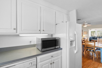 Welcome to this charming 4-bedroom, 3-bathroom fully furnished on Surf Golf and Beach Club in South Carolina - for sale on GolfHomes.com, golf home, golf lot