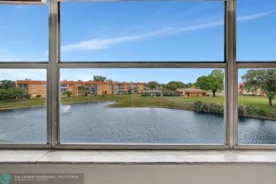 BEAUTIFUL, SPACIOUS 2 BEDROOM, 2 BATH ON THE TOP FLOOR WITH on Sunrise Lakes Phase III in Florida - for sale on GolfHomes.com, golf home, golf lot