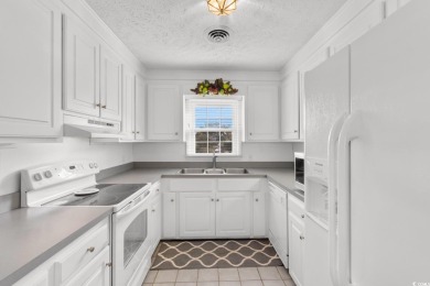 Welcome to this charming 4-bedroom, 3-bathroom fully furnished on Surf Golf and Beach Club in South Carolina - for sale on GolfHomes.com, golf home, golf lot