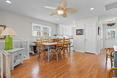 Welcome to this charming 4-bedroom, 3-bathroom fully furnished on Surf Golf and Beach Club in South Carolina - for sale on GolfHomes.com, golf home, golf lot