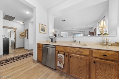 Located in Sun City MacDonald Ranch, this popular single-story on Desert Willow Golf Course in Nevada - for sale on GolfHomes.com, golf home, golf lot