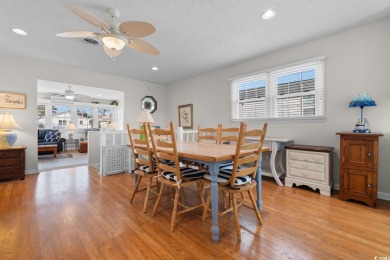 Welcome to this charming 4-bedroom, 3-bathroom fully furnished on Surf Golf and Beach Club in South Carolina - for sale on GolfHomes.com, golf home, golf lot