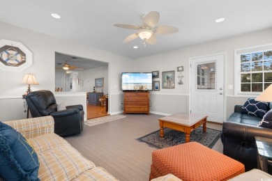 Welcome to this charming 4-bedroom, 3-bathroom fully furnished on Surf Golf and Beach Club in South Carolina - for sale on GolfHomes.com, golf home, golf lot