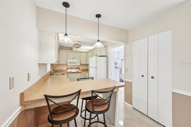 Enjoy effortless Florida living in this fully furnished on Falcon Watch Golf Club in Florida - for sale on GolfHomes.com, golf home, golf lot