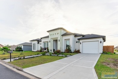 Stunning modern home built in 2022, located in the SPI golf on South Padre Island Golf Club in Texas - for sale on GolfHomes.com, golf home, golf lot