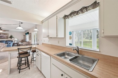 Enjoy effortless Florida living in this fully furnished on Falcon Watch Golf Club in Florida - for sale on GolfHomes.com, golf home, golf lot