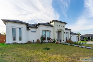 Stunning modern home built in 2022, located in the SPI golf on South Padre Island Golf Club in Texas - for sale on GolfHomes.com, golf home, golf lot