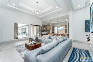 Stunning modern home built in 2022, located in the SPI golf on South Padre Island Golf Club in Texas - for sale on GolfHomes.com, golf home, golf lot