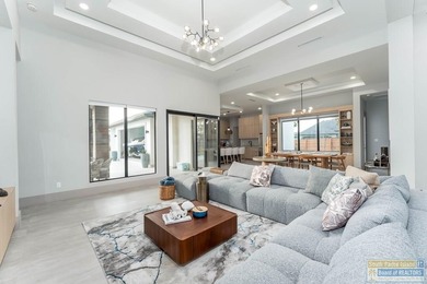 Stunning modern home built in 2022, located in the SPI golf on South Padre Island Golf Club in Texas - for sale on GolfHomes.com, golf home, golf lot