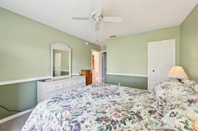 Enjoy effortless Florida living in this fully furnished on Falcon Watch Golf Club in Florida - for sale on GolfHomes.com, golf home, golf lot